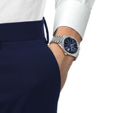Tissot Visodate 39mm T157.407.11.041.00 front view – deep blue dial, silver stainless steel case, Dauphine hands, index hour markers, date window, grey grains of rice stainless steel bracelet - on wrist