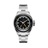The Timex Atelier Automatic GMT Men's 40mm Watch TW2Y72300 features a black enamel dial with a 24-hour ring and an orange GMT hand for tracking a second time zone.