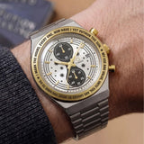 The Timex x Harry Potter Time Turner Quartz Chronograph 40mm Watch TW2Y75900 pairs its 40mm stainless steel case with a silver-tone bracelet on the wrist. The gold-tone bezel adds a warm accent to the silver finish.