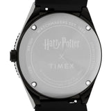The Timex x Harry Potter Time Turner Quartz 36mm Watch TW2Y76000 has a case back engraved with the Harry Potter logo. A battery-powered quartz analog movement sits inside the case.