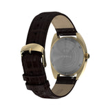 The Timex 1976 Rotary Phone Dial Reissue Quartz 37mm Watch TW2Y82100 features a snap-on stainless steel case back. The brown leather strap fastens with a classic buckle clasp.