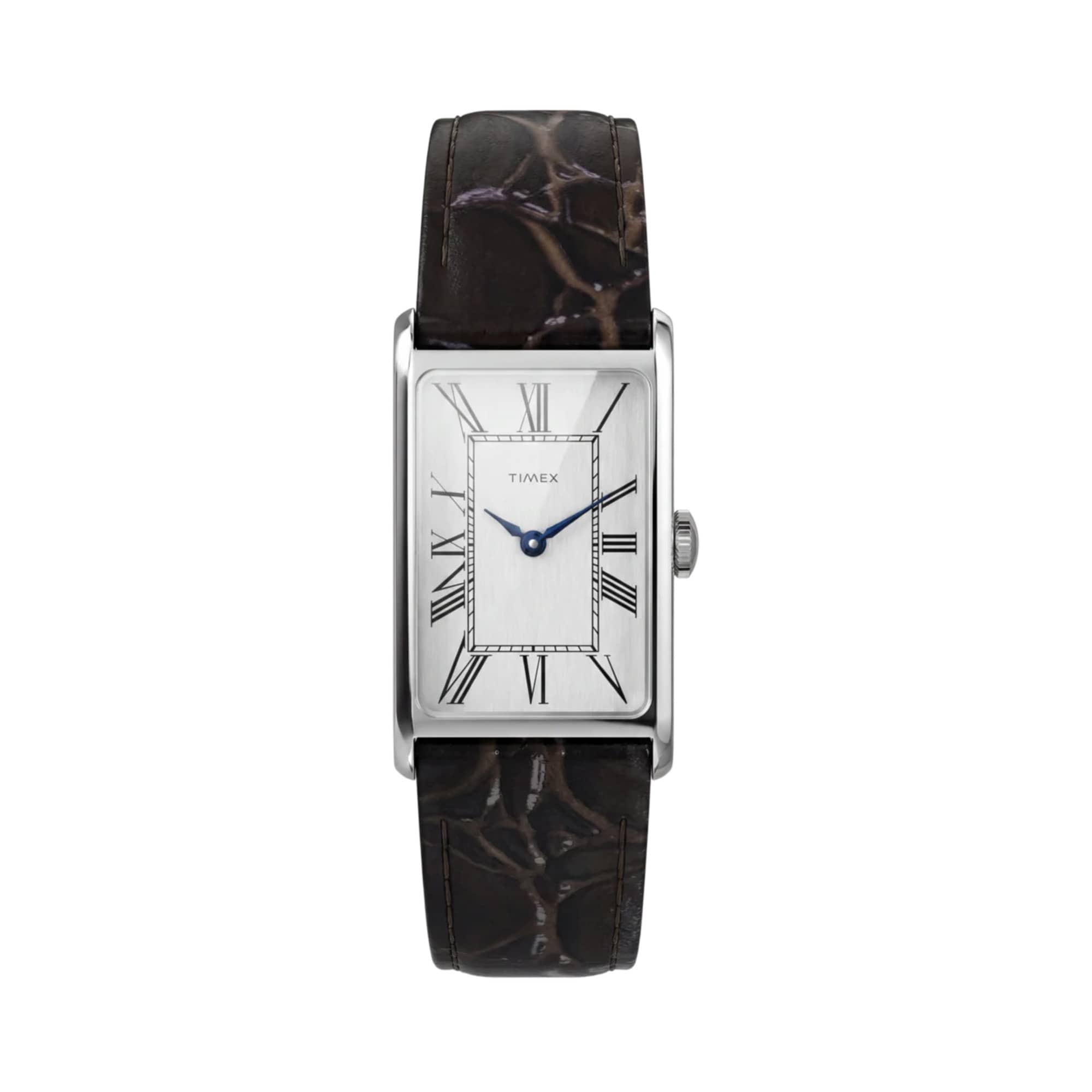 The Timex Lexington Quartz 21mm Watch TW2Y88200 features a silver dial finished with vertical brushing, elongated Roman numerals, and metallic blue hands for a subtle pop of contrast.