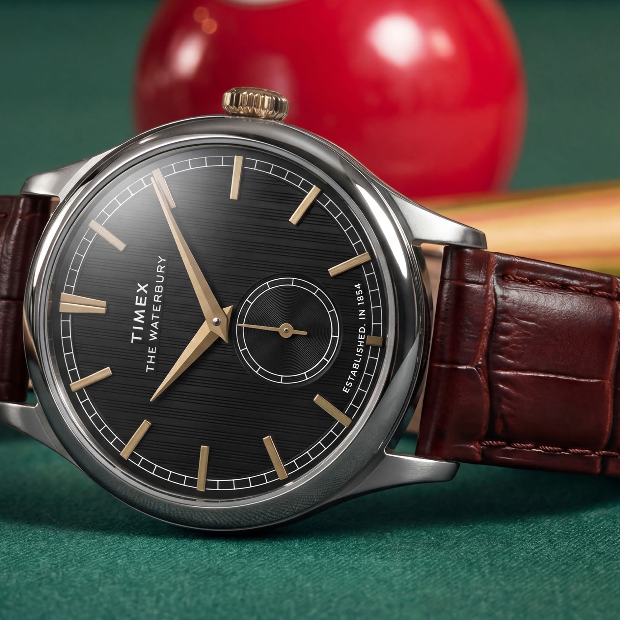 The Timex Waterbury Traditional Quartz 39mm Watch TW2Y92100 suits both the office and smart-casual dressing, worn day-to-day. The textured black dial and brown leather strap bring a timeless yet fresh look to any outfit.