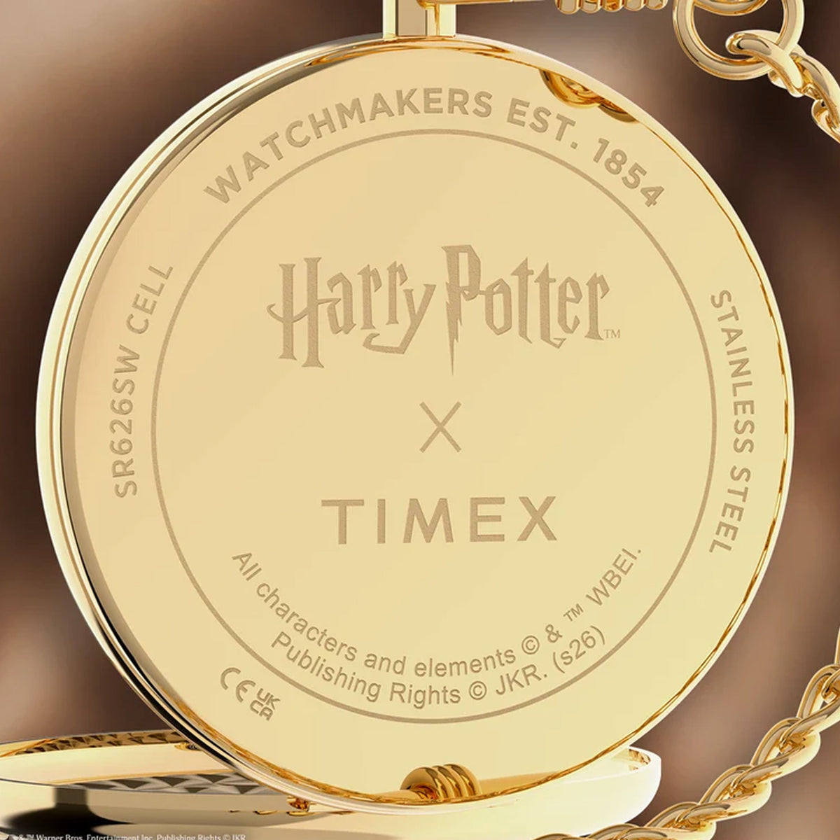 The Timex x Harry Potter Time Turner 48.5mm Pocket Watch TW2Y99600 has a case back engraved with the Harry Potter and Timex logos. A battery-powered quartz analog movement sits inside the case.