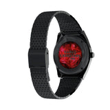 The Timex x Harry Potter Sorcerer’s Stone 38mm Quartz Watch TW2Y99700 shows its round black IP-coated stainless steel case from the side. A vintage-style domed acrylic crystal covers the red dial.