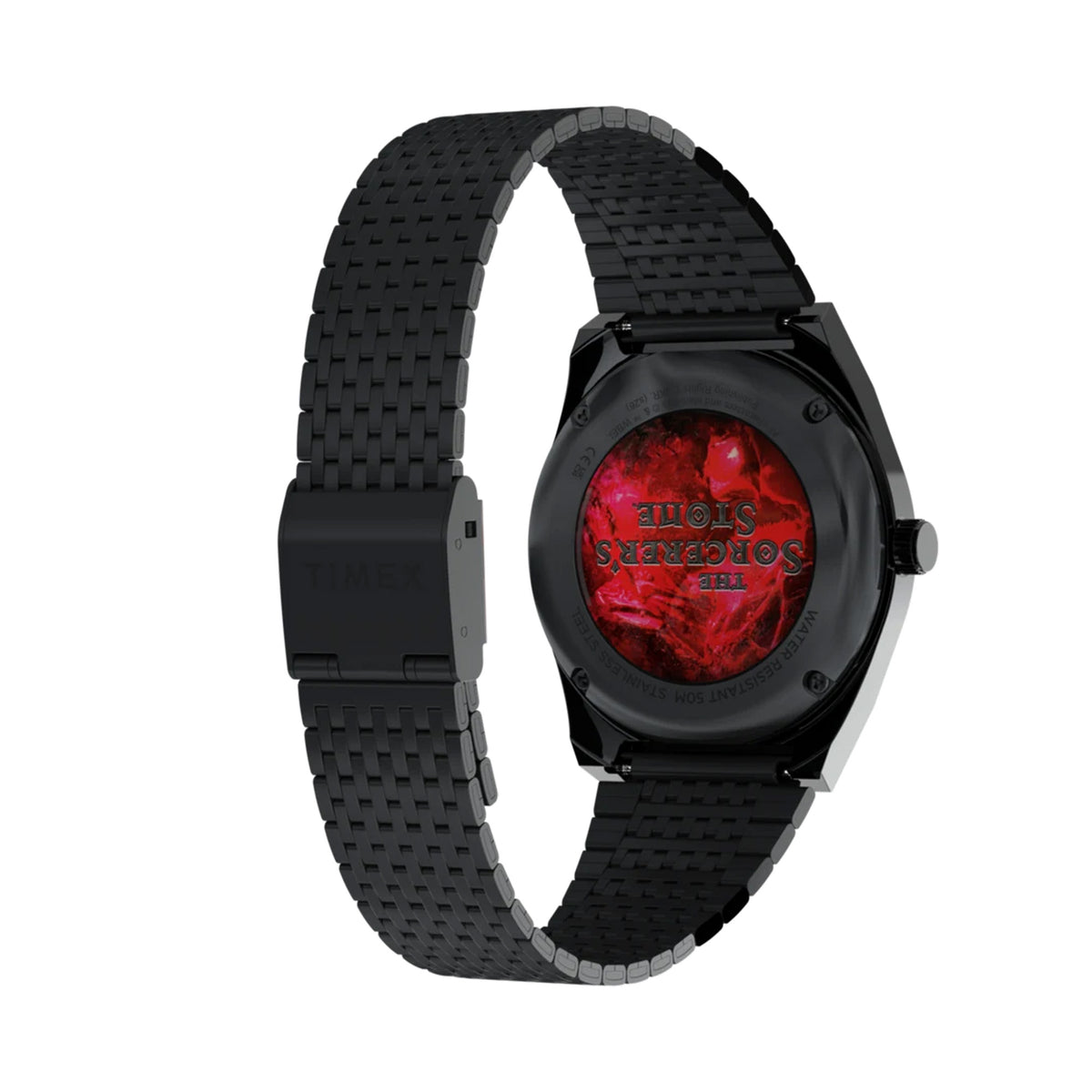 The Timex x Harry Potter Sorcerer’s Stone 38mm Quartz Watch TW2Y99700 shows its round black IP-coated stainless steel case from the side. A vintage-style domed acrylic crystal covers the red dial.