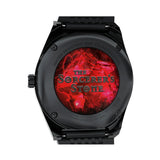 The Timex x Harry Potter Sorcerer’s Stone 38mm Quartz Watch TW2Y99700 has an exhibition window on the case back that displays the name The Sorcerer’s Stone. A battery-powered quartz analog movement sits inside the case.