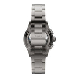 The Timex Atelier Chronograph Automatic M1a Ti Men's 42mm Watch TW6A02700 features an exhibition case back revealing the Swiss automatic movement, alongside a titanium bracelet with a custom butterfly deployant clasp.