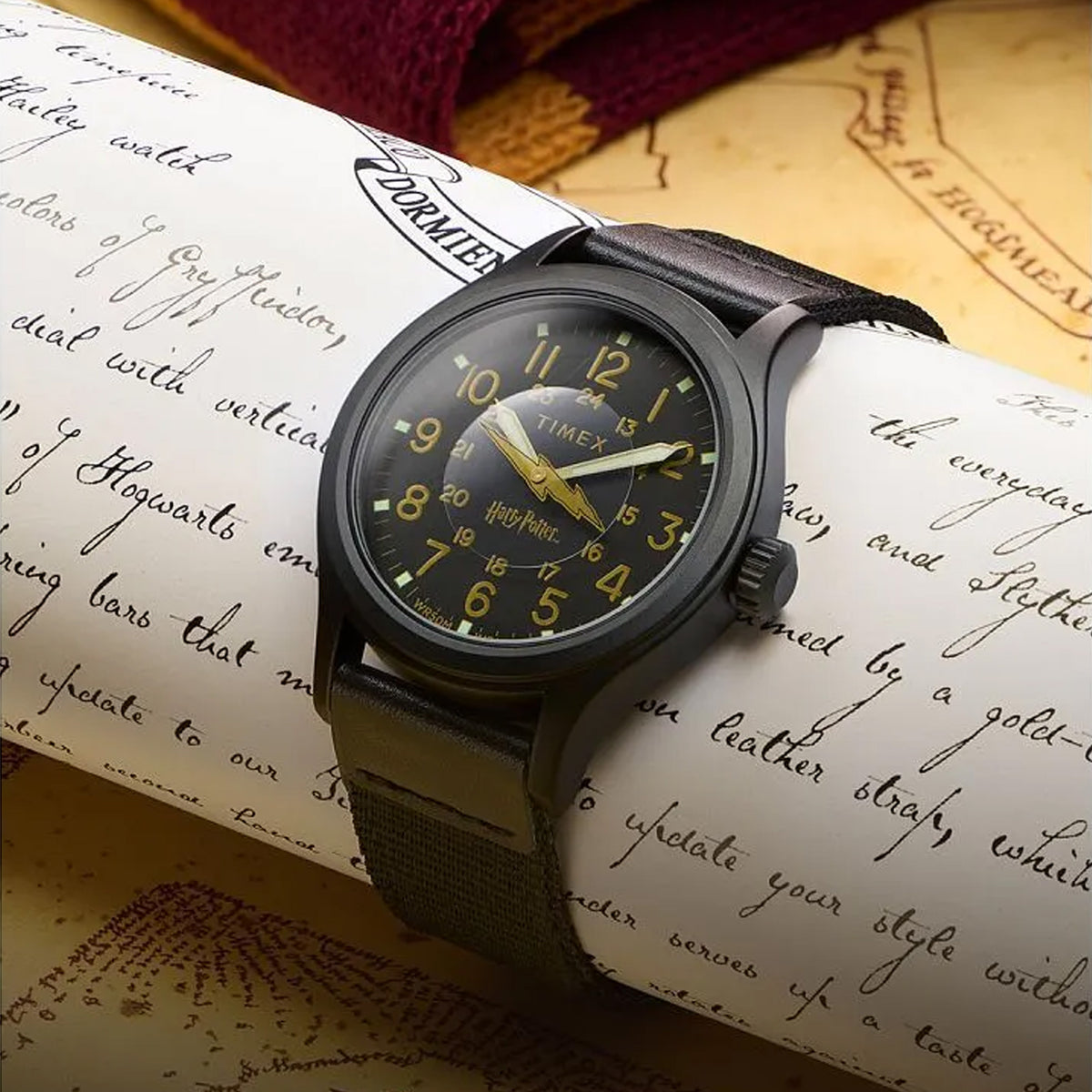 The Timex x Harry Potter Bolt Expedition Scout Quartz 40mm Watch TW6A05700 suits everyday adventures and Harry Potter fans alike. Pressing the crown turns on the INDIGLO backlight, which lights up Harry’s glasses across the dial.