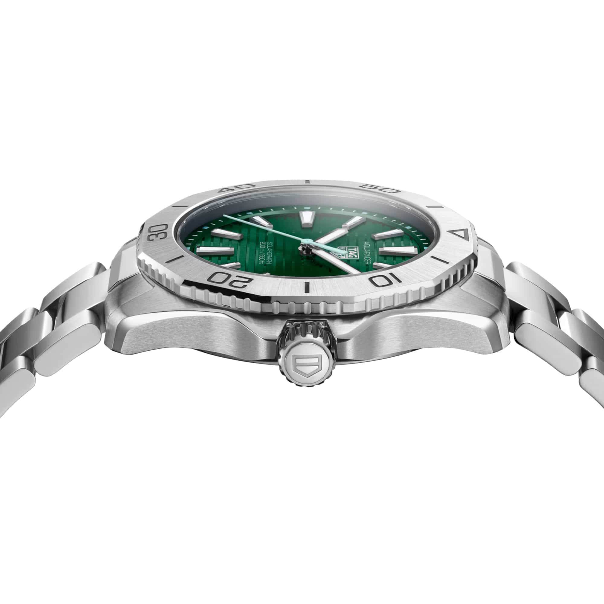TAG Heuer Aquaracer Professional 200 Solargraph WBP1115.BA0000 photographed from a side profile, showing the case thickness and screw-down crown. The steel bracelet and bezel are visible together in frame.