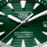 TAG Heuer Aquaracer Professional 200 Solargraph WBP1118.BA0047 steel watch with green dial, rotating bezel, and solar-powered quartz movement.
