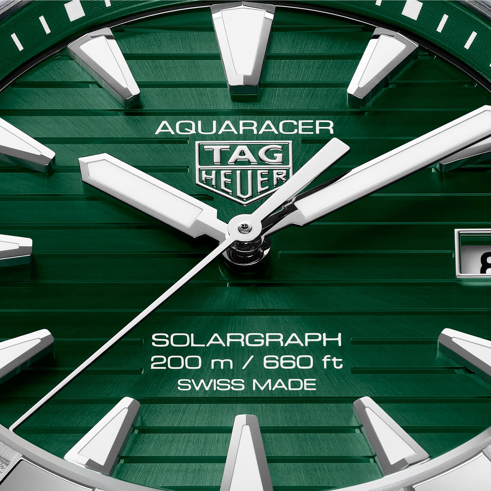 TAG Heuer Aquaracer Professional 200 Solargraph WBP1118.BA0047 steel watch with green dial, rotating bezel, and solar-powered quartz movement.