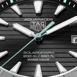 Close up - TAG Heuer Aquaracer Professional 200 Solargraph WBP1184.BF0008 titanium watch with black dial, rotating bezel, and solar-powered quartz movement.