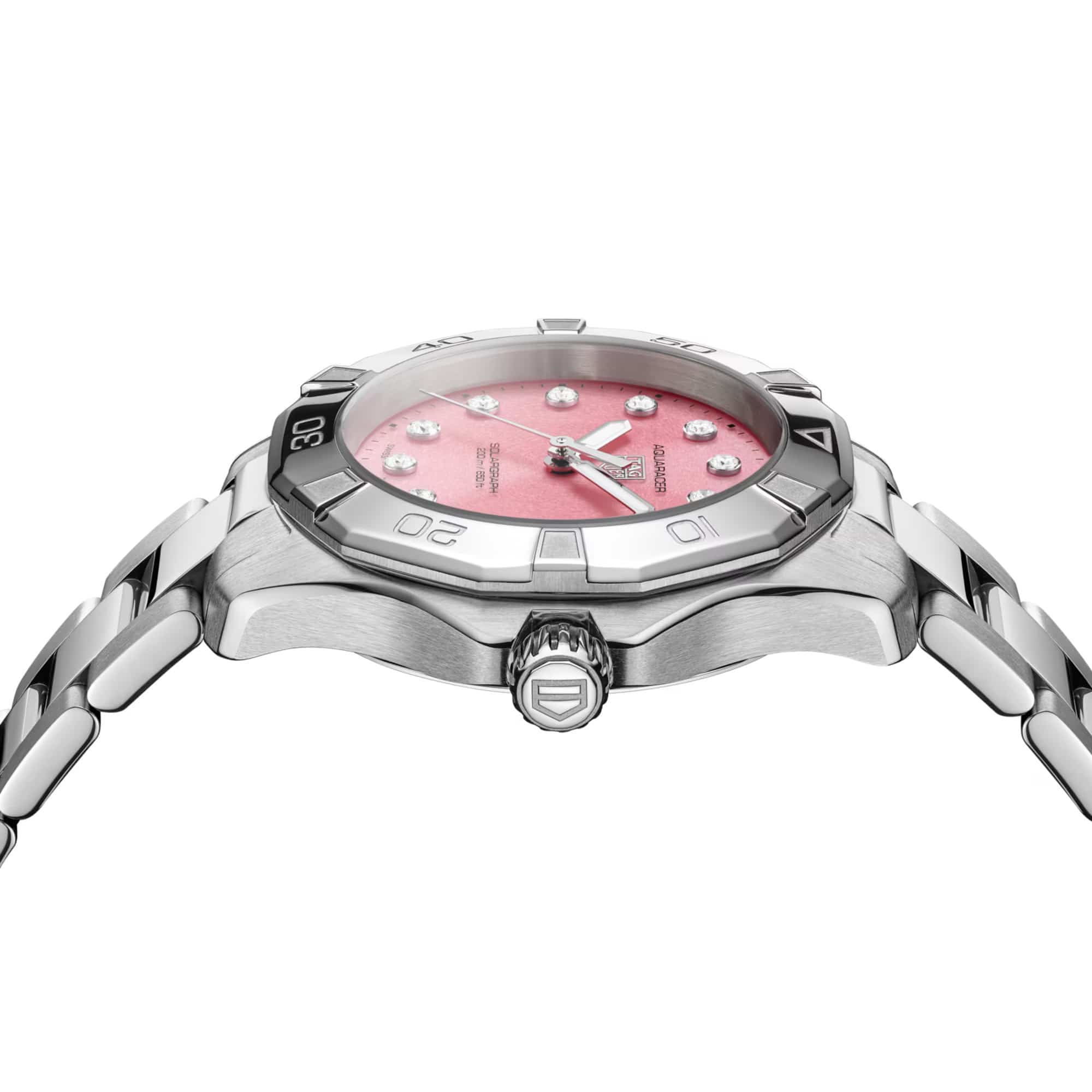 TAG Heuer Aquaracer Professional 200 Solargraph WBP1318.BA0005 photographed from a side profile, showing the case thickness and screw-down crown. The steel bracelet and bezel riders are visible together in frame.