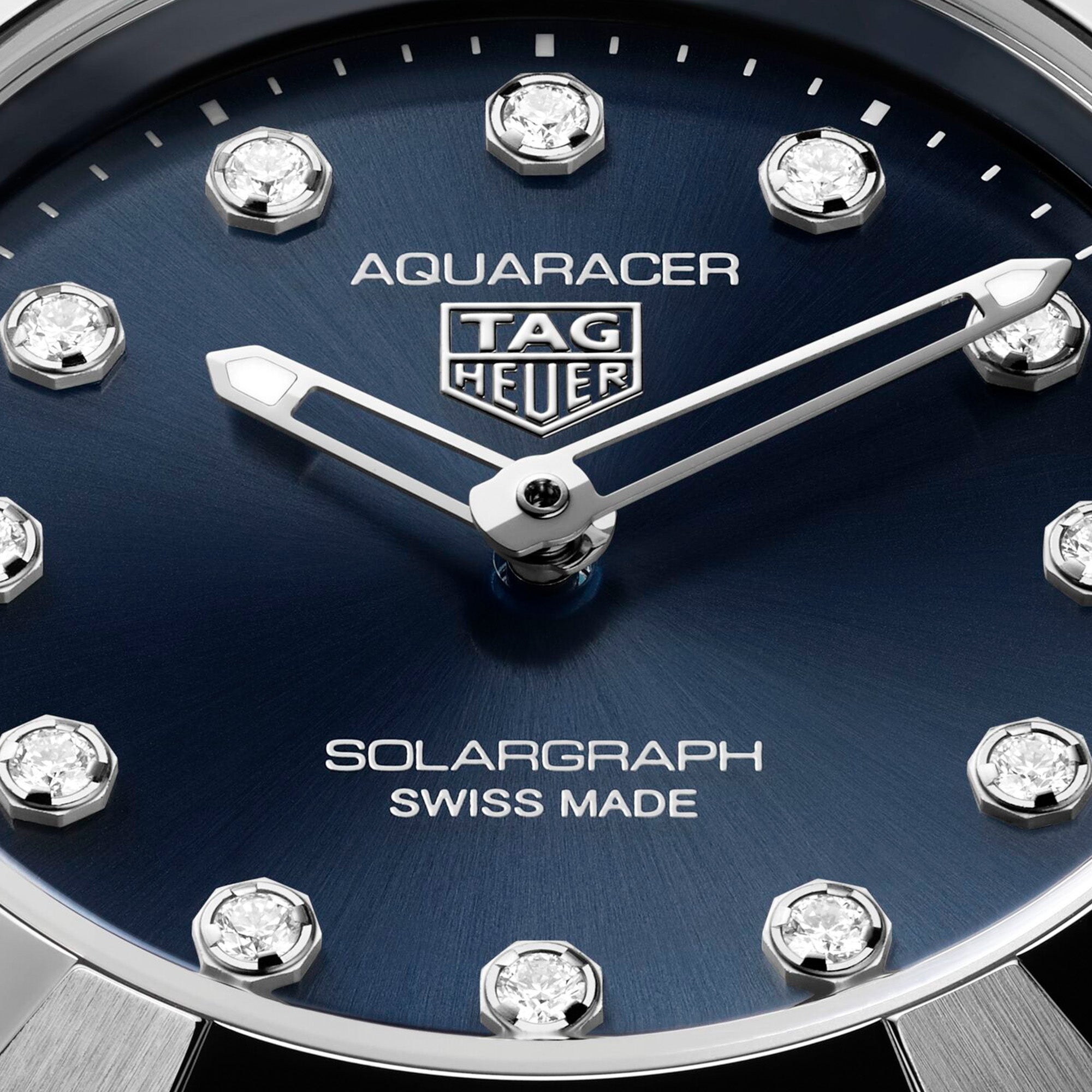 TAG Heuer Aquaracer Professional 100 Solargraph WBP141E.BA0049 steel watch with blue diamond dial and solar-powered quartz movement.