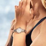 TAG Heuer Aquaracer Professional 100 Solargraph WBP141J.BA0049 steel watch with diamond-set bezel, white mother-of-pearl dial, and solar-powered quartz movement - on wrist