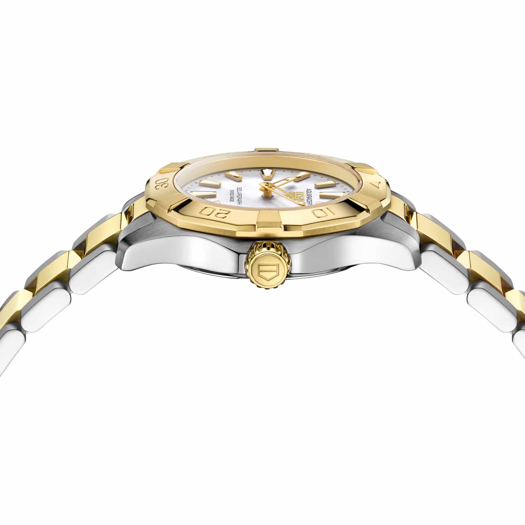 TAG Heuer Aquaracer Professional 100 Solargraph WBP1423.BB0006 photographed from a side profile, showing the case thickness and gold-plated crown. The two-tone bracelet and fixed bezel are visible together in frame.
