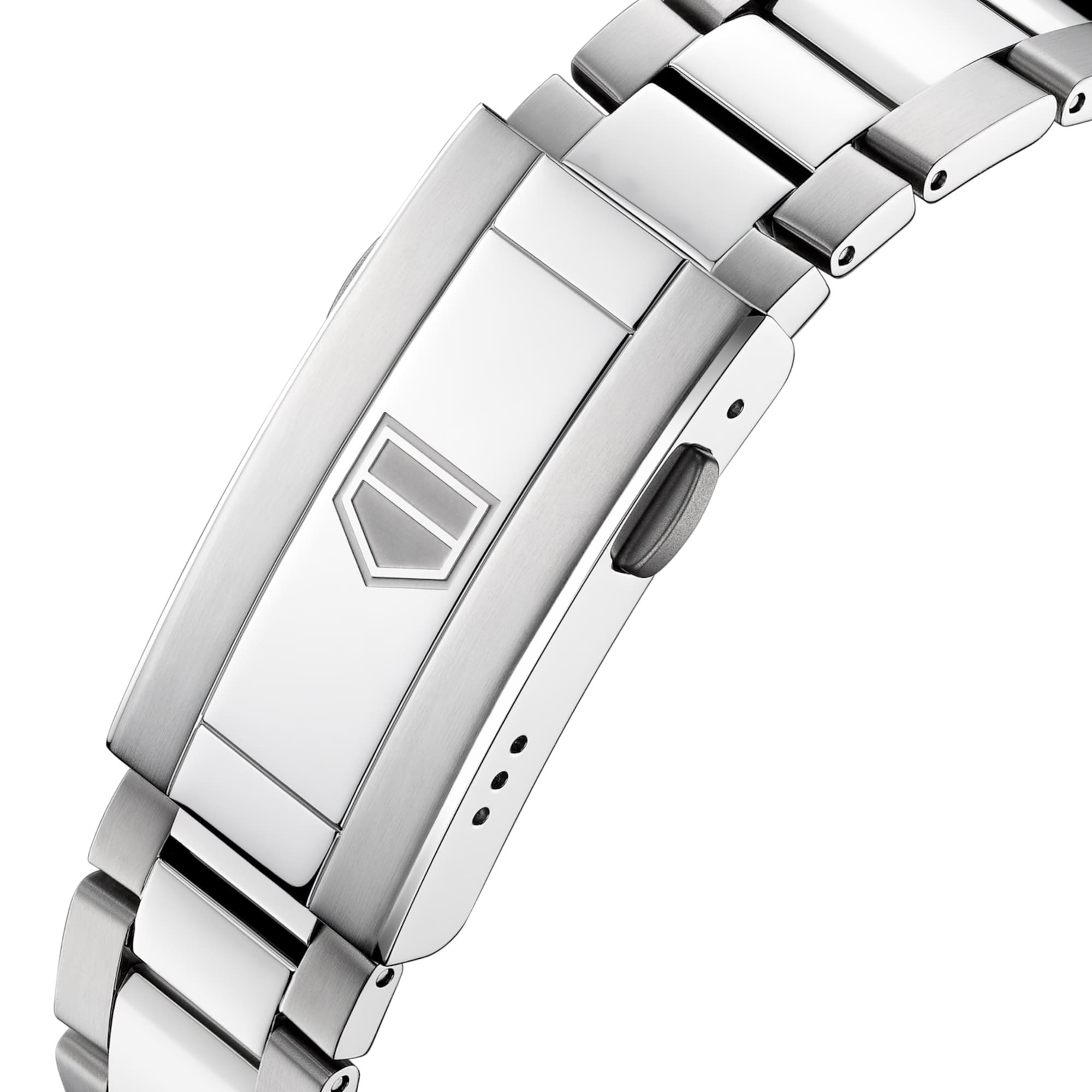TAG Heuer Aquaracer Professional 200 Date WBP2111.BA0627 photographed in close-up focusing on the tapered steel bracelet's link detailing. The case is partially visible at the top of the frame, connecting to the bracelet via the lugs.