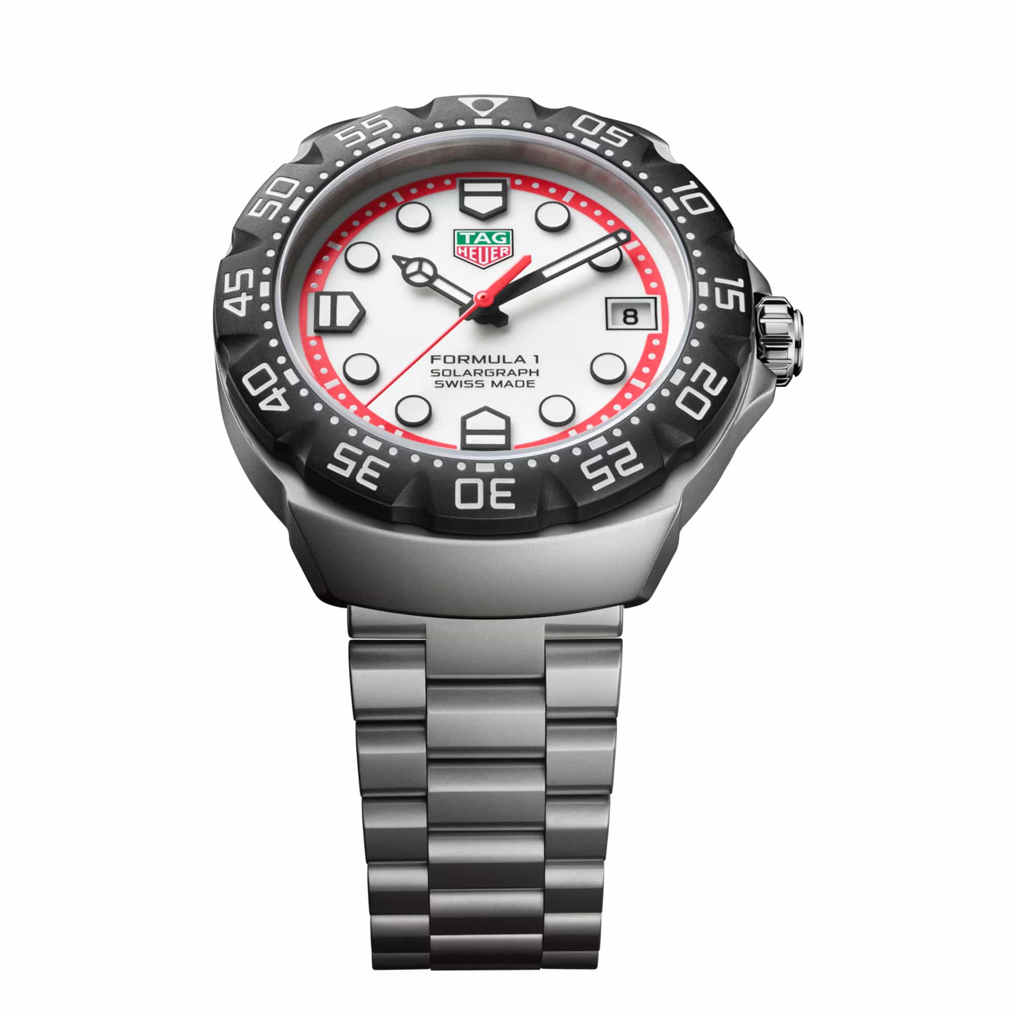 TAG Heuer Formula 1 Solargraph WBY1111.BA0042 photographed at an angle highlighting the white dial's red minute track and black TH-Polylight bezel. The steel bracelet curves away from the lugs, showing its link construction.