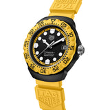 TAG Heuer Formula 1 Solargraph WBY1117.FT8087 photographed at an angle highlighting the black dial's yellow accents and TH-Polylight bezel. The yellow rubber strap curves away from the lugs, showing its textured finish.