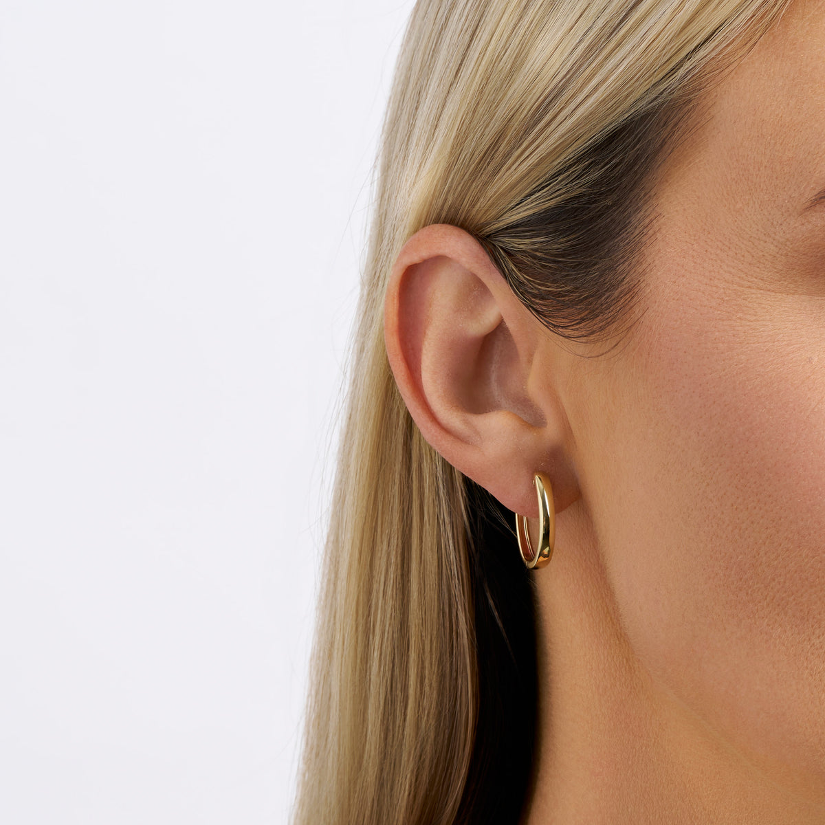 Oval Hoop Huggies in 9ct Yellow Gold