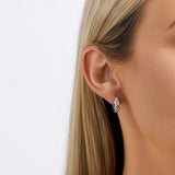 Cubic Zirconia Polished Huggies Earrings in Sterling Silver