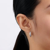 Cubic Zirconia Polished Huggies Earrings in Sterling Silver