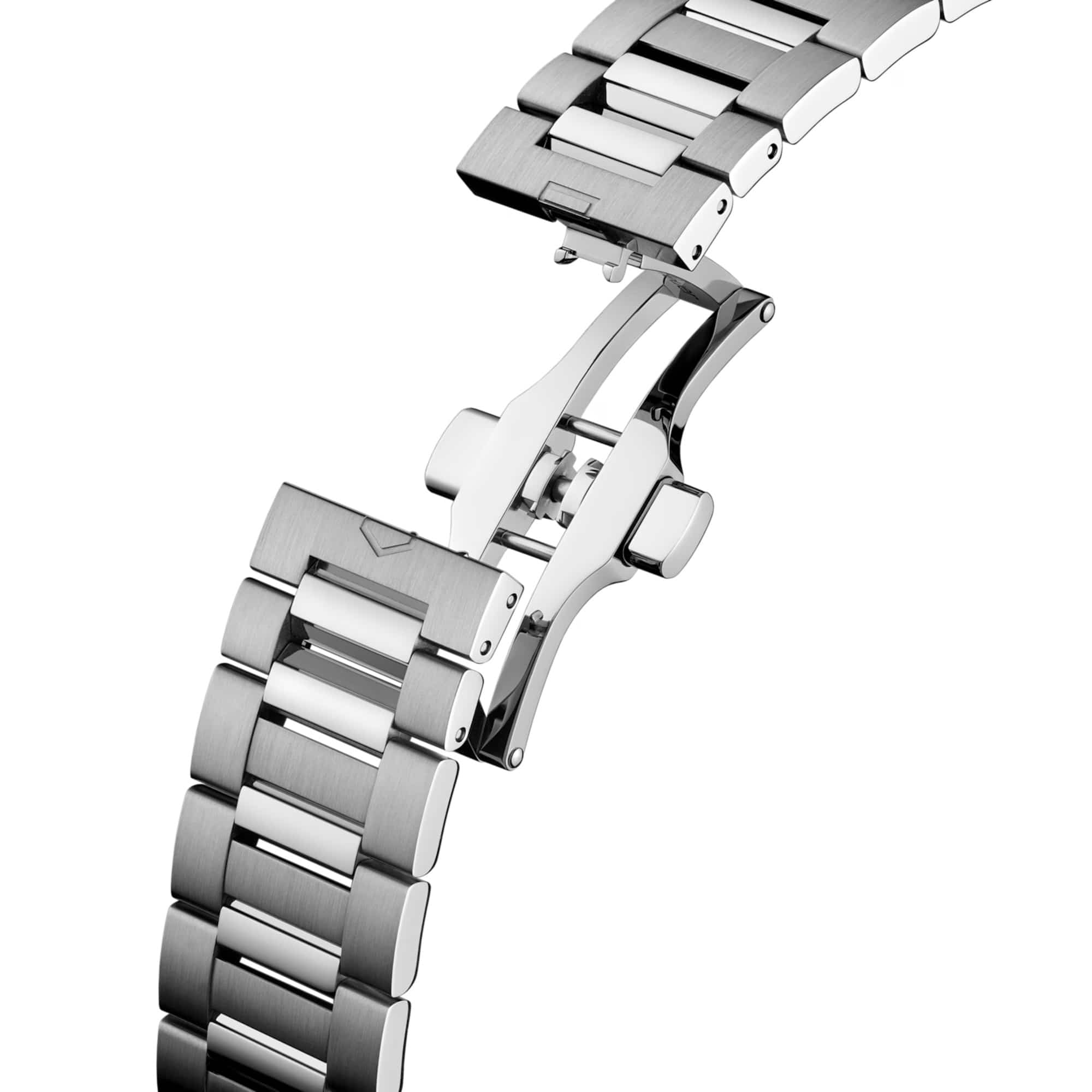 TAG Heuer Carrera Date Twin-Time WDA2114.BA0043 photographed in close-up focusing on the steel bracelet's polished and brushed link detailing. The case is partially visible at the top of the frame, connecting to the bracelet via the lugs.