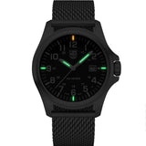 Luminox Patagonia Steel Men's 43mm Quartz Watch X2.2501.M glowing in the dark with Luminox Light Technology. The self-powered tritium tubes on the hands and markers of this Luminox G-Collection watch glow constantly for up to 25 years.