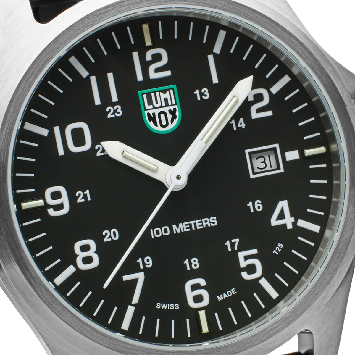 Close-up of the black dial on the Luminox Patagonia Steel Men's 43mm Quartz Watch X2.2501, showing the large white numerals, hands and date window. This Luminox G-Collection watch features self-powered tritium tubes on the hands and markers for constant visibility.