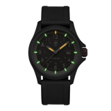 Luminox Bear Grylls Survival Land Men's 43mm Quartz Watch XB.3716 glowing in the dark with Luminox Light Technology. The 14 self-powered tritium tubes on this Bear Grylls Survival Land 3710 Series watch glow constantly for up to 25 years.