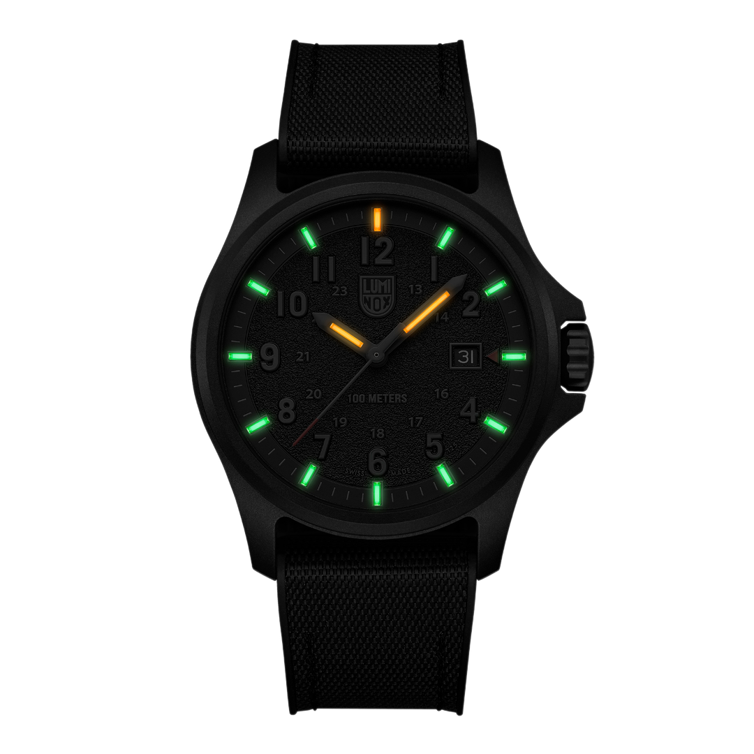 Luminox Atacama Field Men's 43mm Quartz Watch XL.1961 glowing in the dark with Luminox Light Technology. The self-powered tritium tubes on the hands and markers of this Atacama Field watch glow constantly for up to 25 years.