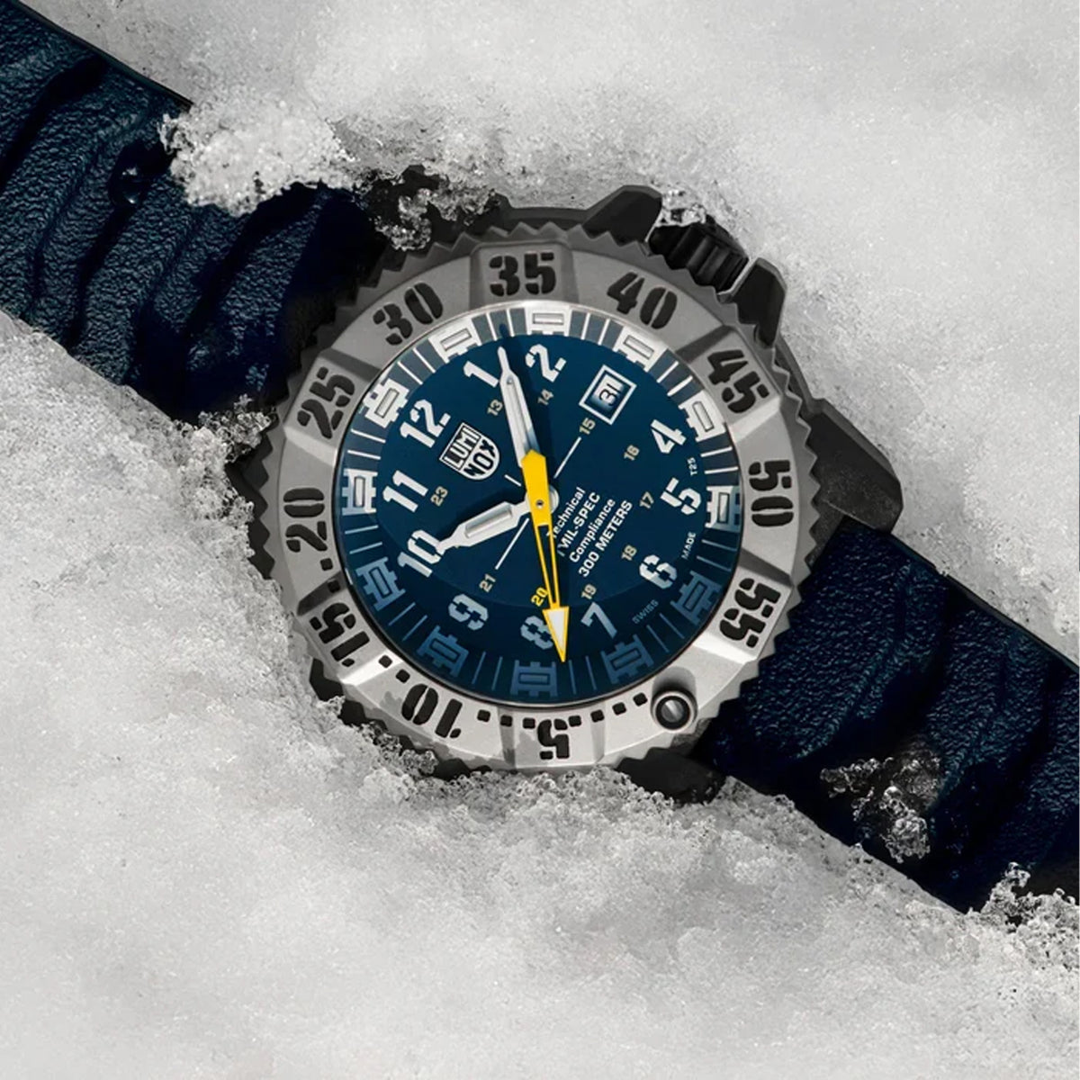 Luminox MIL-SPEC Inspired Men’s 46mm Quartz Watch XL.3355.2 shown in a rugged outdoor setting. This MIL-SPEC 3350 Series military watch features a blue dial, a titanium bezel and 300m water resistance.