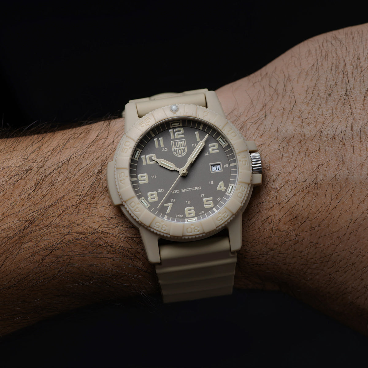 Luminox Leatherback SEA Turtle Giant Men’s 44mm Quartz Watch XS.0326 worn on the wrist to show its size and fit. This Leatherback SEA Turtle Giant watch features a sand-coloured dial, a rotating bezel and a lightweight sand CARBONOX™ case on a matching strap.