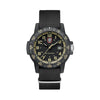 Front view of the Luminox Leatherback SEA Turtle Giant Men's 44mm Quartz Watch XS.0333 with a black dial and beige numerals. This Leatherback SEA Turtle Giant watch features a black CARBONOX™ turtle-shaped case, a black rotating dive bezel with beige numbers and a black webbing strap.