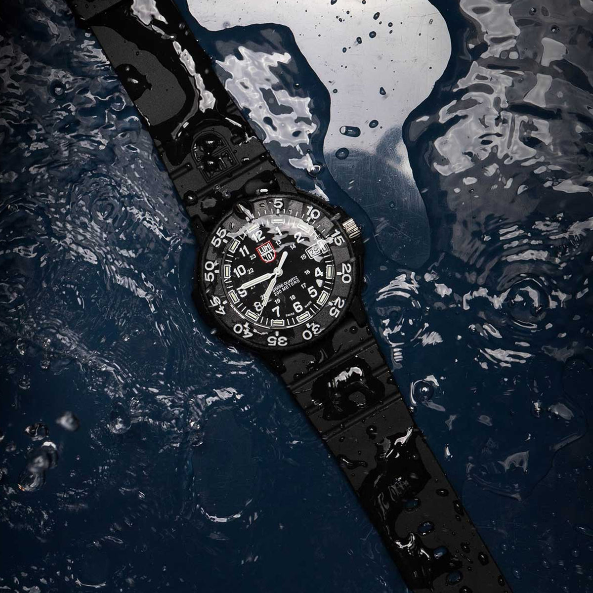 Luminox Original Navy SEAL Men's 43mm Quartz Watch XS.3001.F shown in a rugged outdoor setting. This Original Navy SEAL 3000 Series dive watch features a black dial, a lightweight black CARBONOX™ case and 200m water resistance.