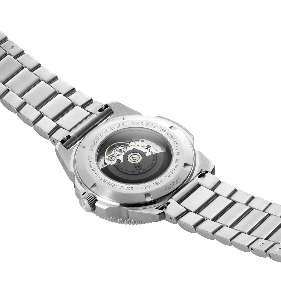 A behind image of a stainless steel luminox watch