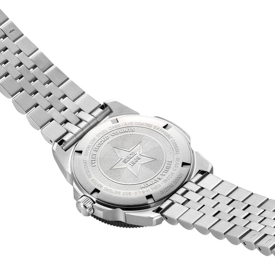 A behind image of a stainless steel luminox watch