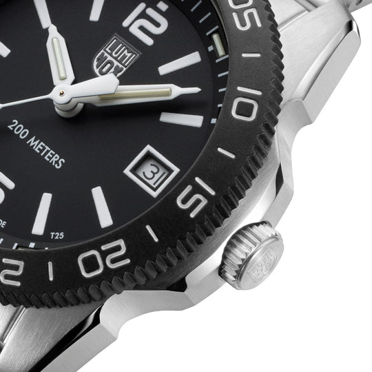 Close up of a Luminox watch case with a Black face and white accents