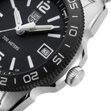 Close up of a Luminox watch case with a Black face and white accents