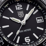 Close up of a Luminox watch case with a Black face and white accents