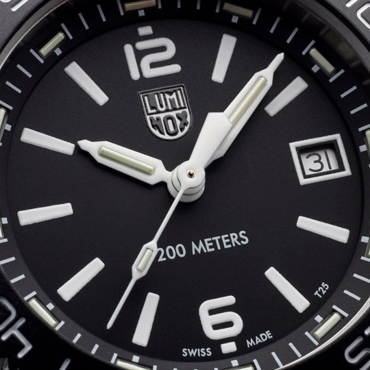 Close up of a Luminox watch case with a Black face and white accents