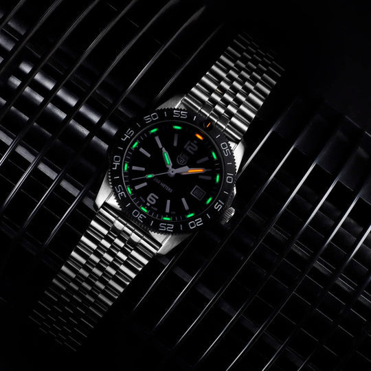 A Stainless Steel Luminox Watch with Green and Yellow Lume