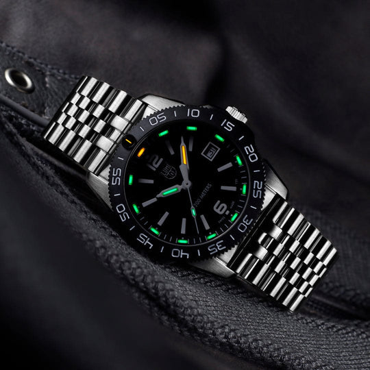 A Stainless Steel Luminox Watch with Green and Yellow Lume
