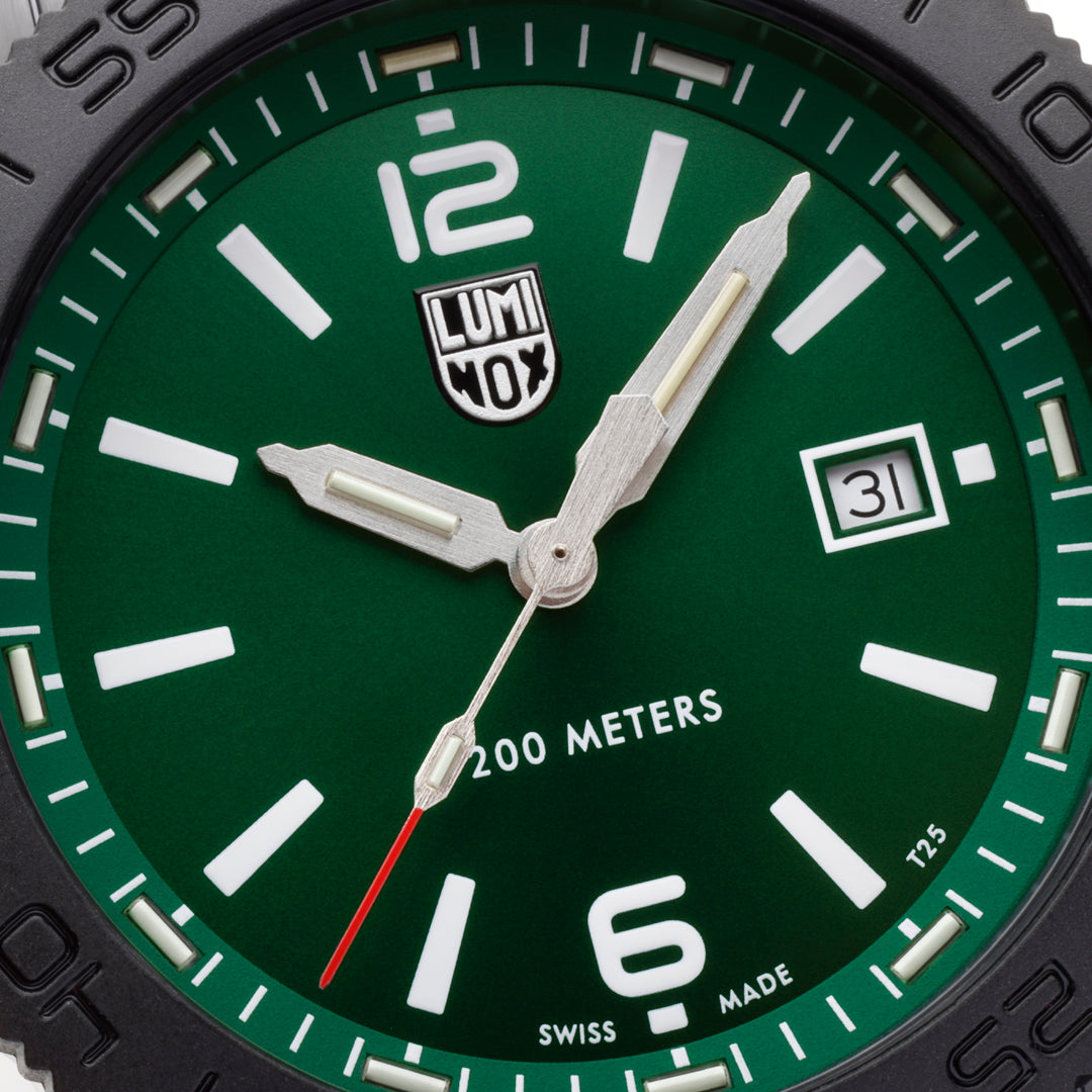Close-up of the pin buckle on the black cut-to-fit rubber strap of the Luminox Pacific Diver Men's 44mm Quartz Watch XS.3137.B. This Pacific Diver 3120 Series strap can be trimmed to fit any wrist size.