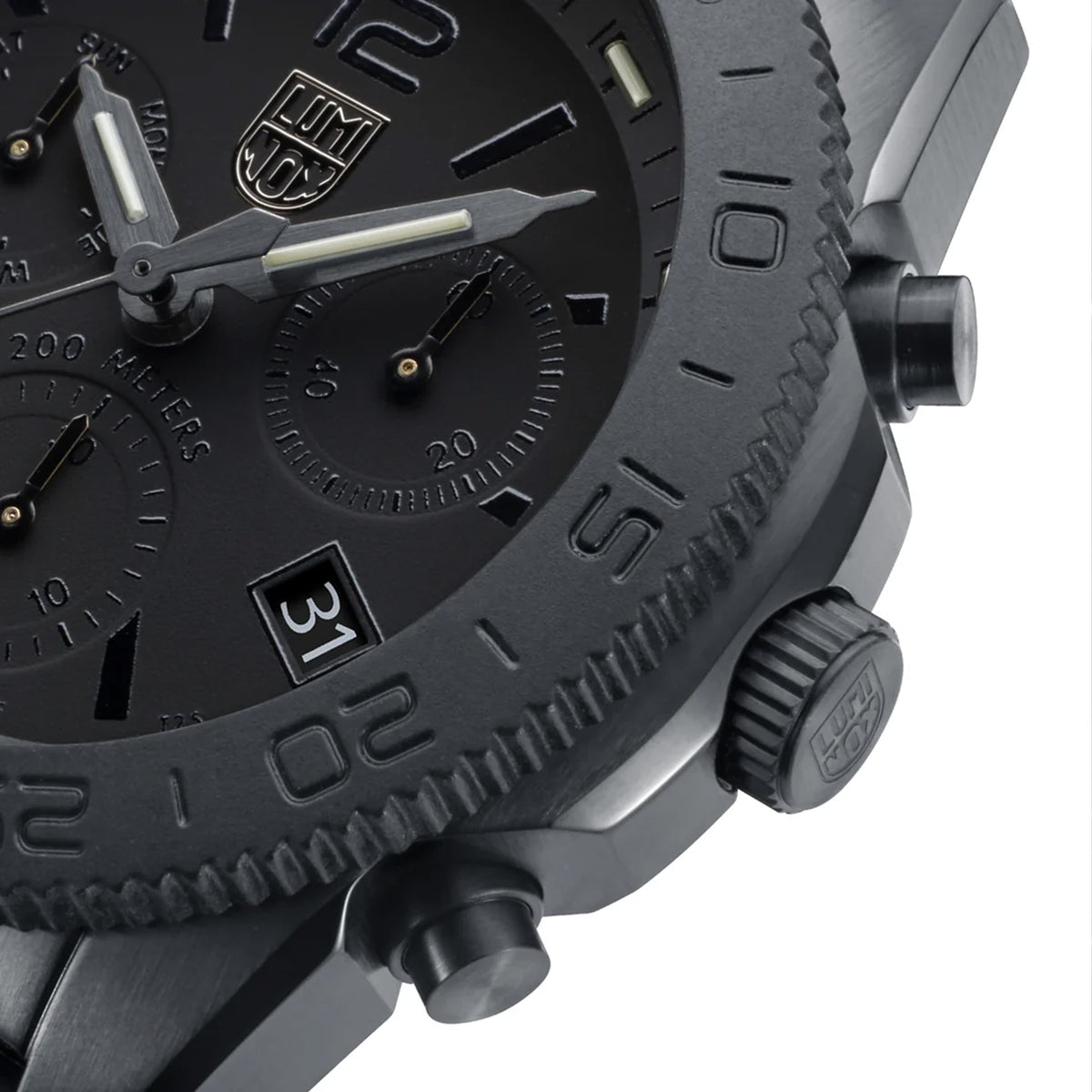 Three-quarter angle view of the Luminox Pacific Diver Chronograph Men's 44mm Quartz Watch XS.3141.BO.1 showing the screw-in crown and chronograph pushers. This Pacific Diver Chronograph pairs a black stainless steel case with a blackout dial under anti-reflective sapphire crystal.