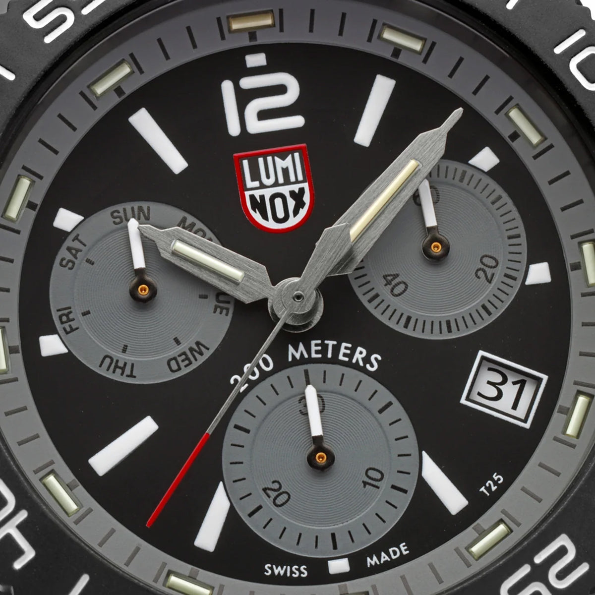 Close-up of the graphite grey dial on the Luminox Pacific Diver Chronograph Men’s 44mm Quartz Watch XS.3148, showing the three chronograph sub-dials, luminous hands and markers, and date window. This Pacific Diver Chronograph features self-powered tritium tubes for constant visibility in the dark.
