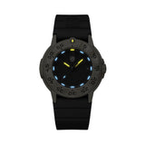 Luminox Navy SEAL Foundation Gold Color Edition Men's 43mm Quartz Watch XS.3221.NSF glowing in the dark with yellow and ice blue Luminox Light Technology. The self-powered tritium tubes on this Navy SEAL Foundation 3220 Series watch glow constantly for up to 25 years.