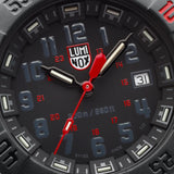 Close-up of the black dial on the Luminox Navy SEAL 3550 Men’s 44mm Quartz Watch XS.3565, showing the numerals in the official U.S. Navy font, the red seconds hand and the luminous hands and markers. This Navy SEAL 3550 Series watch features 16 self-powered tritium tubes for constant visibility in the dark.
