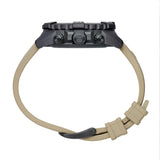 Close-up of the buckle on the sand rubber strap of the Luminox Navy SEAL Foundation Men's 45mm Quartz Chronograph Watch XS.3590.NSF.SET. This Navy SEAL Foundation Chronograph set also includes a jungle green webbing strap and a strap-changing tool.